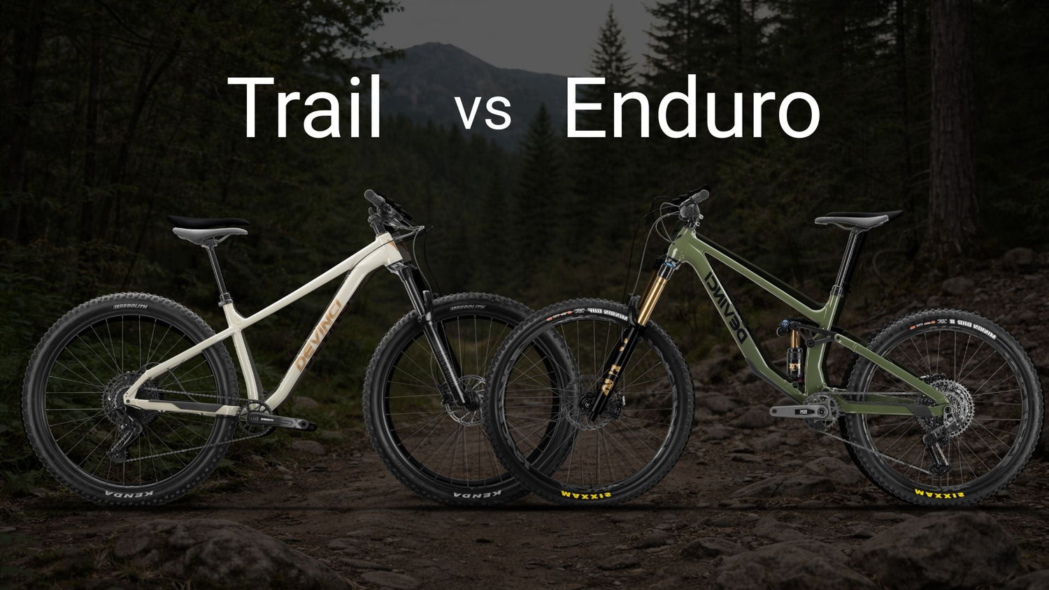 Trail vs enduro mountain bikes comparison showing two Devinci bikes on a forest trail
